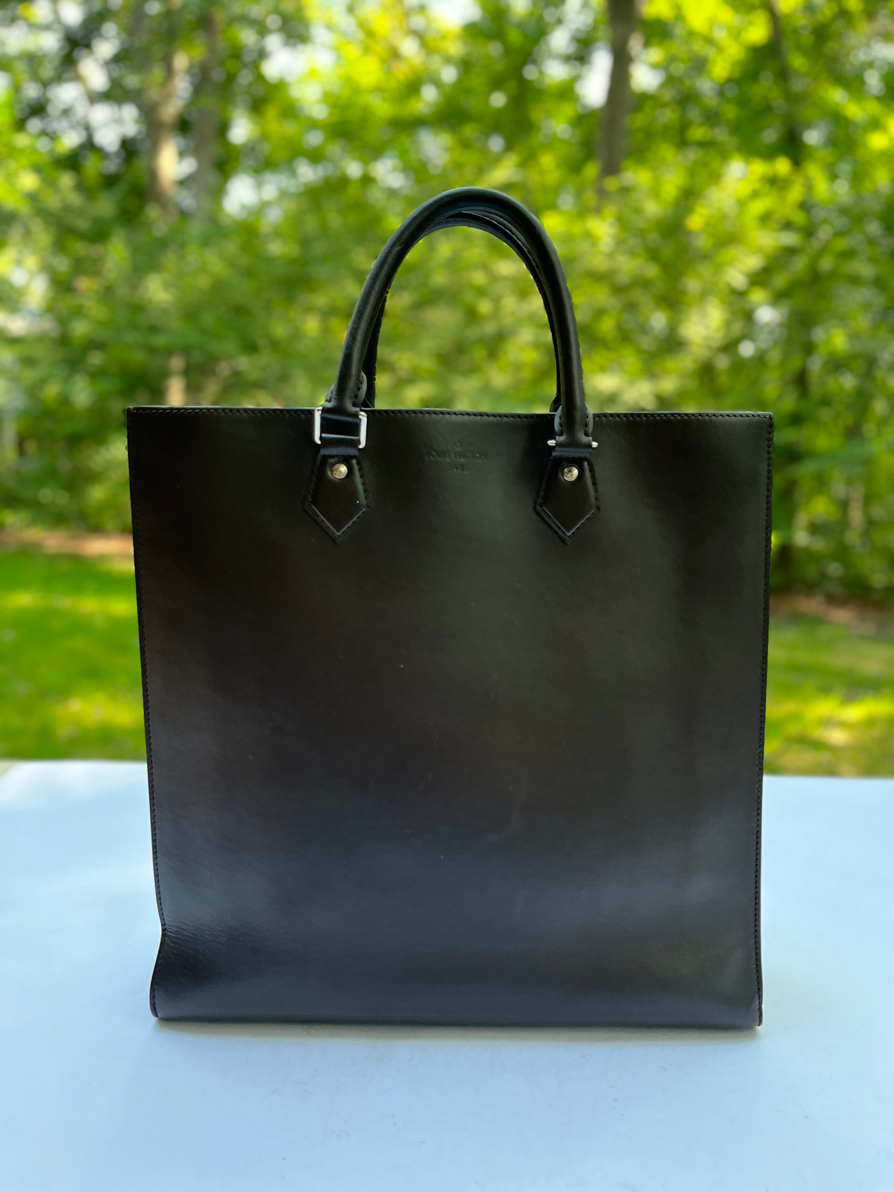 Louis Vuitton Nomade Leather Sac Plat in Dark Brown – Chicago