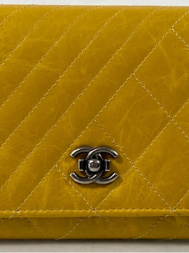Chanel Aged Creasing Lambskin Leather Yen Wallet in Yellow