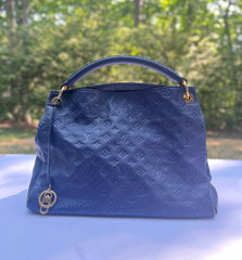 Louis Vuitton Artsy medium model shopping bag in blue empreinte monogram  leather