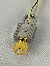 Hermes Epsom Leather Clochette, Silver Lock with One Gold Key in Cream