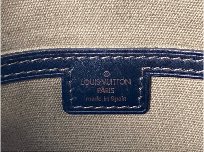 Louis Vuitton Utah Leather Sac Plat in Brown