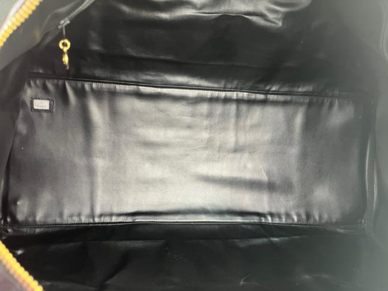 Chanel Caviar Leather CC Duffle 60 in Black – Chicago Consignment