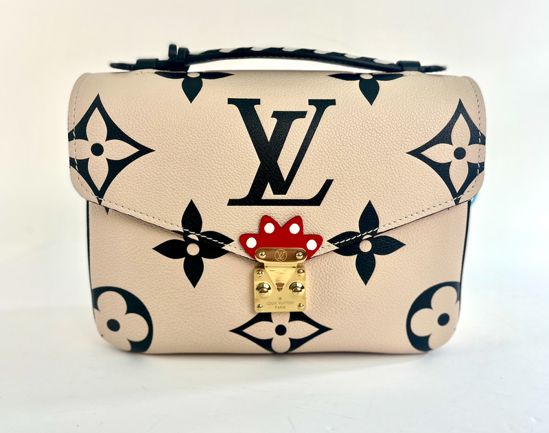 Louis Vuitton Crafty Pochette Hand Bag